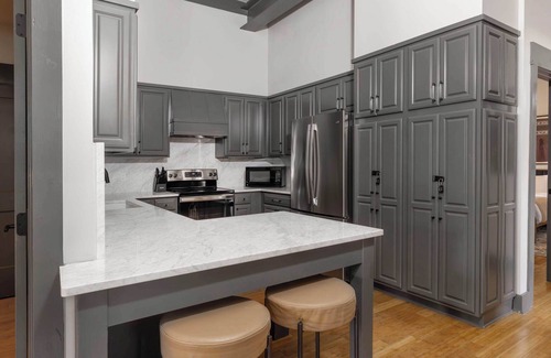 Old West Broad Neighborhood Condo | Refurbished Townhome | Free Parking