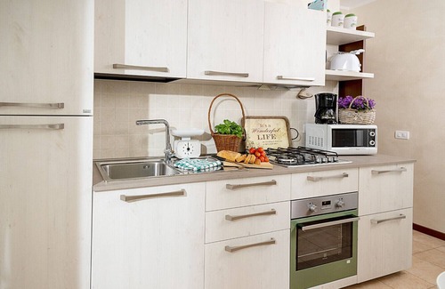 Cola Apartment | Regarda - cozy apartment L'Archetto with private garden, WiFi, pool
