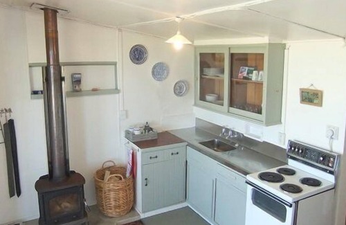 Glenburn House | Relax and unwind in this little cute bach.