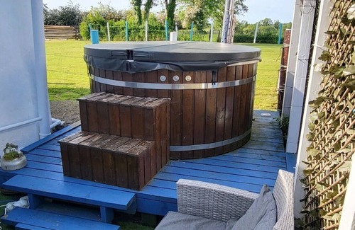 Ballintober House | Relax and unwind with hot tub and open fire
