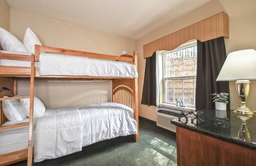 Pembine Hotel | Relax in Charming Room After a Day of Island Adventure | Pet-Friendly