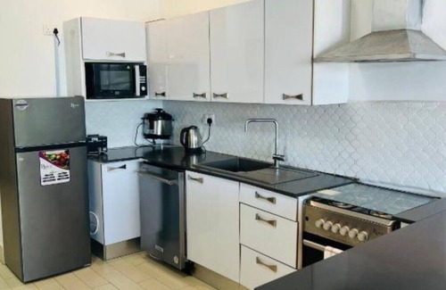 Serrekunda House | Relax Oceanfront Suites - Three-Bedroom Apartment - High Floor