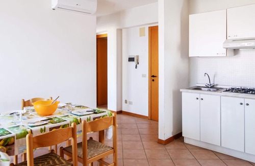 Campofilone Apartment | Relax with a cool drink on your terrace overlooking the sea.