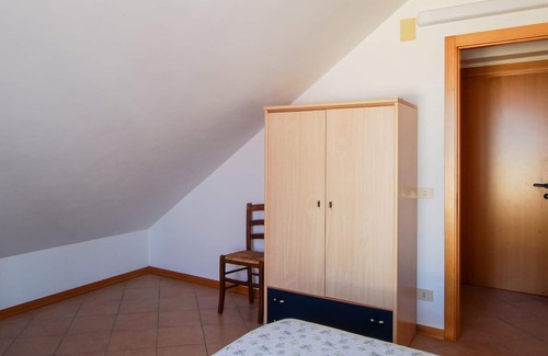 Campofilone Apartment | Relax with a cool drink on your terrace overlooking the sea.