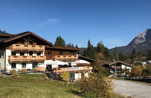 Biberwier Apartment | Relax wonderfully, and into an apartment with a view of the slopes/mountains.