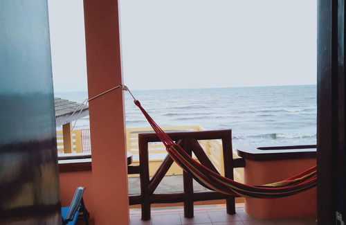 Calapan Condo | Relaxing beach side condo with mountain and island views.