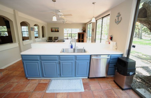 Cedar Lane House | Relaxing Caney Creek views or just minutes from the beach!