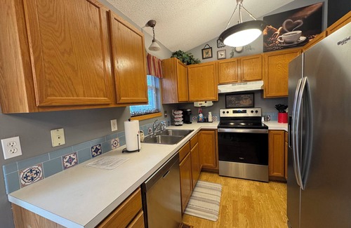 Wichita House | Relaxing Getaway with Outdoor Patio, Fire Pit, and Pool Table