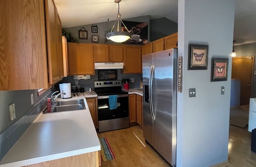 Wichita House | Relaxing Getaway with Outdoor Patio, Fire Pit, and Pool Table