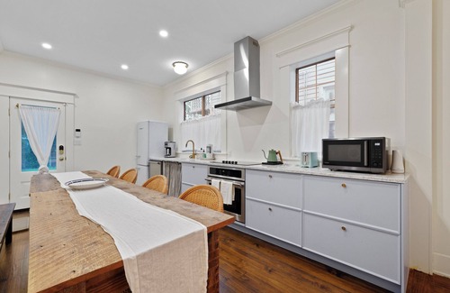 Metropolitan Apartment | Renovated Bright + Airy Home in Prime Location by Lucky Savannah
