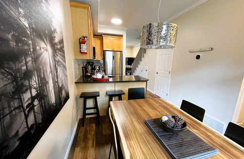 Canmore Ski Chalet | 🥇 RENOVATED Chalet at Mystic Springs, Heated Pool, Hot Tub!