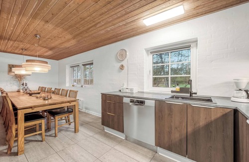 Øby House | Renovated thatched pool house by the North Sea for 16 people.