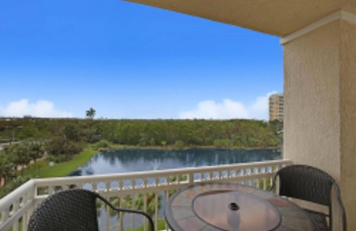 Boynton Beach Condo | RESORT LIVING AT CASA COSTA-OVERLOOKING LAGOON-CORNER UNIT-Walk to Beach!