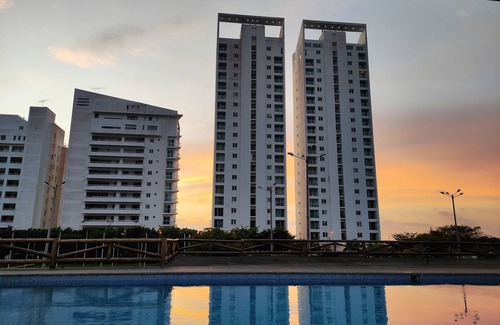 Tonsupa Apartment | Resort Playa Azul Tonsupa Apartment with a view of 2 rooms.