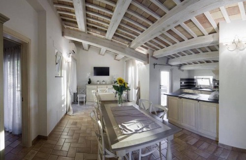 Potenza Picena Villa | Resort surrounded by greenery arranged for families or groups with an infinity pool.