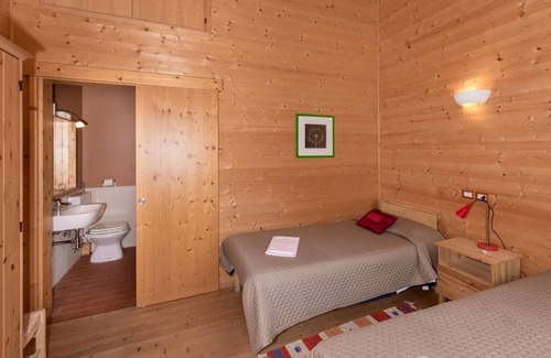 Ponte d'Assi Cabin | Retino Wood House - wooden cottage with veranda - green energy