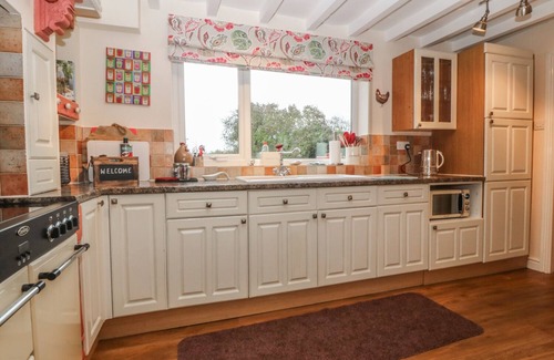 Newborough Cottage | RHIANFA, pet friendly, with open fire in Newborough