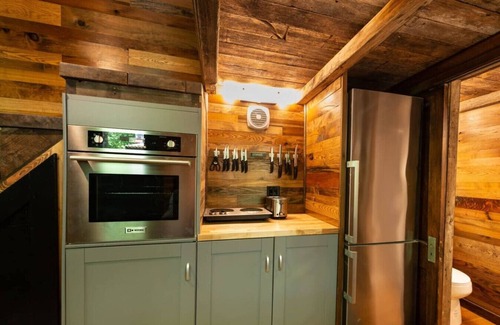 Willard House | River Retreat Tiny Homes:Wood Sauna/Rec Room/River