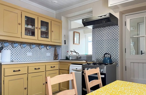 Youlgreave Cottage | River View sits beside the River Bradford with views of the hills and river.