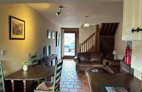 Brecon House | Riverbank Barn Conversion (dated 1770) Offers Luxury Accommodation 15 People