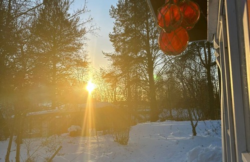 Aanekoski Ski Chalet | Riverfront cottage, sauna, hot tub, rowing boat, fishing, pets welcome.