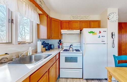 Monument Beach House | Riverfront gem features, outdoor shower, gas grill, deck, river views, W/D