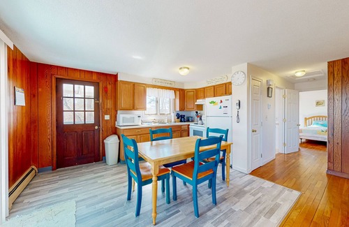 Monument Beach House | Riverfront gem features, outdoor shower, gas grill, deck, river views, W/D
