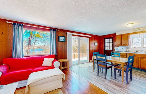 Monument Beach House | Riverfront gem features, outdoor shower, gas grill, deck, river views, W/D