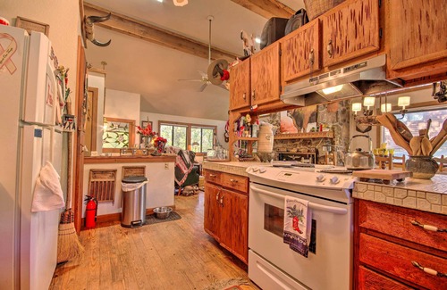 Mammoth Spring Cabin | Riverfront Getaway w/Treehouse, Fire Pit & Deck!