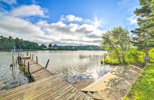Cheboygan House | Riverfront Home with Dock about 6 Mi to Cheboygan!