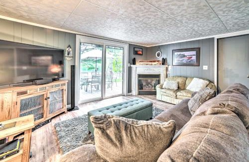 Cheboygan House | Riverfront Home with Dock about 6 Mi to Cheboygan!