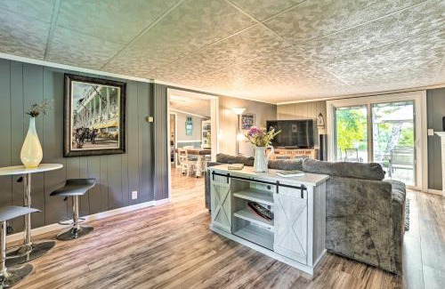 Cheboygan House | Riverfront Home with Dock about 6 Mi to Cheboygan!