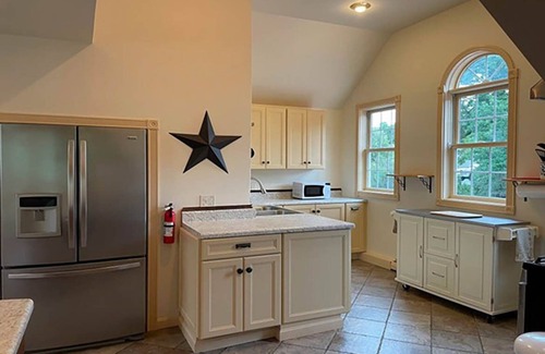Manchester Center House | Rivers Edge 2-bedroom house in Manchester with WiFi, AC on second floor.