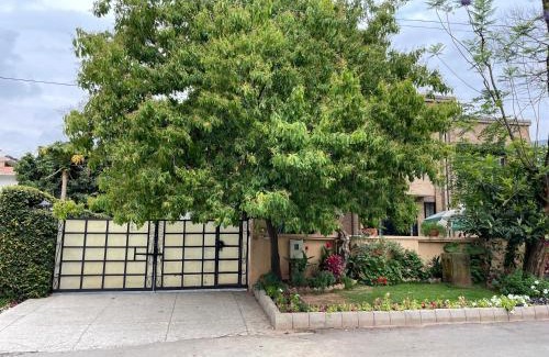 F-8 Sector House | Riviera Courtyard Guest House Islamabad
