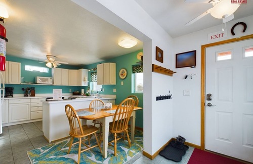 Munising House | Rock House-Downtown Munising with Private Patio, Garage, Fire-pit & BBQ Grill
