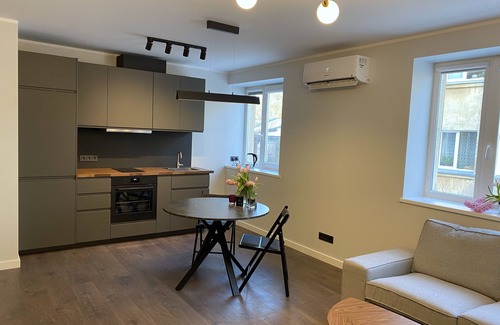 Mezaparks Apartment | Romantic apartment with wood burning stove located in green, quiet neighbourhood