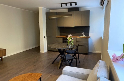 Mezaparks Apartment | Romantic apartment with wood burning stove located in green, quiet neighbourhood