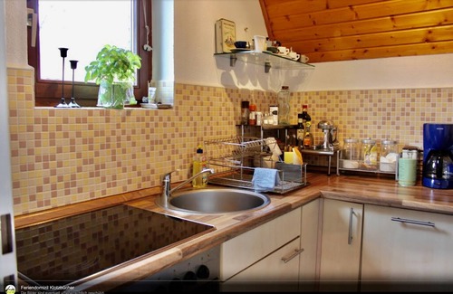 Neufeld House | Roof house with 70m² on two levels with a garden, 150m to the dike
