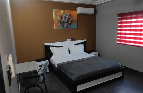 Lome House | Room-deluxe Double Bed in Royal Blue Gue