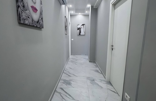 Monte Po-Nesima-San Leone-Rapisardi Apartment | Room 'Dolce Relax - Tripla Luxury' with Wi-Fi and Air Conditioning