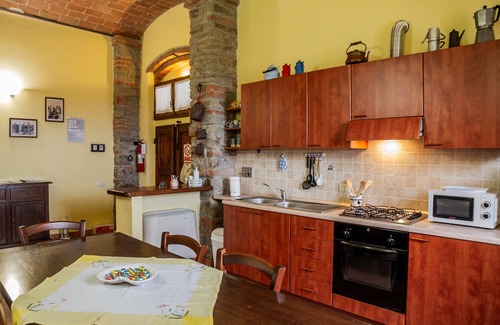 Castiglione della Pescaia Apartment | Room 'La Mangiatoia' with Shared Terrace, Shared Garden and Wi-Fi