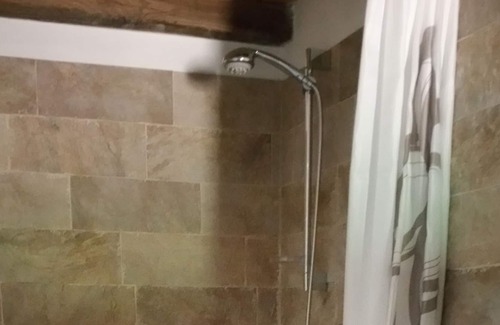 Passerano Marmorito House | Room with bathroom and hallway, 2 beds