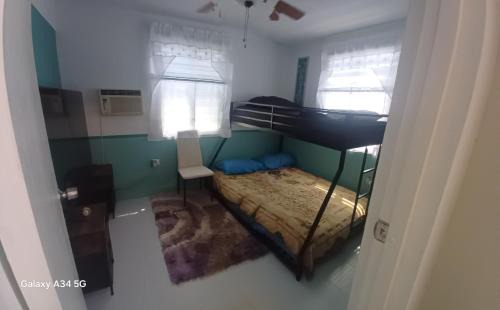 Villa Borinquen House | Rooster Run Guest House offers Vieques travelers newly furnished quaint affordable airconditioned rooms and only steps from the Ferry and nearby beaches