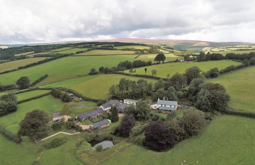Wheddon Cross Cottage | Rose Cottage is located in the heart of Exmoor National Park at Wheddon Cross. Dog friendly