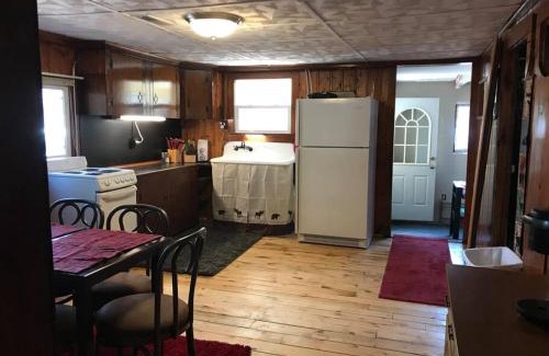 Luzerne House | Royce’s Outpost Rustic cabin nearby trails