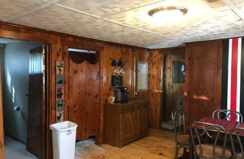 Luzerne House | Royce’s Outpost Rustic cabin nearby trails