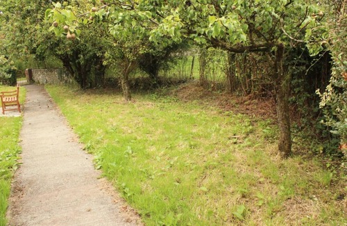 Llangefni House | Rural Hideaway with Hot Tub, Orchard & Games Room