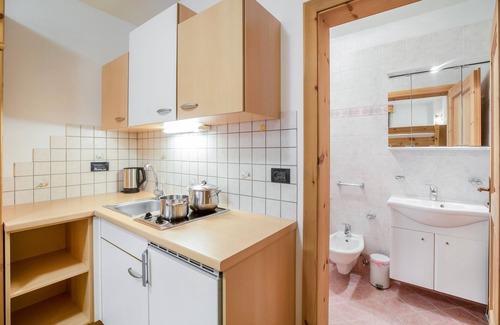 Colfosco Apartment | Rustic Apartment near Ski Areas with Wi-Fi, Garden and Terrace