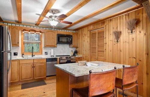 Bellville Cabin | Rustic cabin with hot tub, fire pit and close to area attractions!