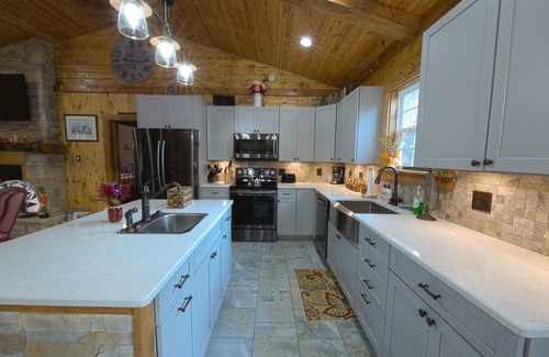 Winchester Cabin | Rustic Cabin with modern amenities and 1 acre stocked Fishing Lake !